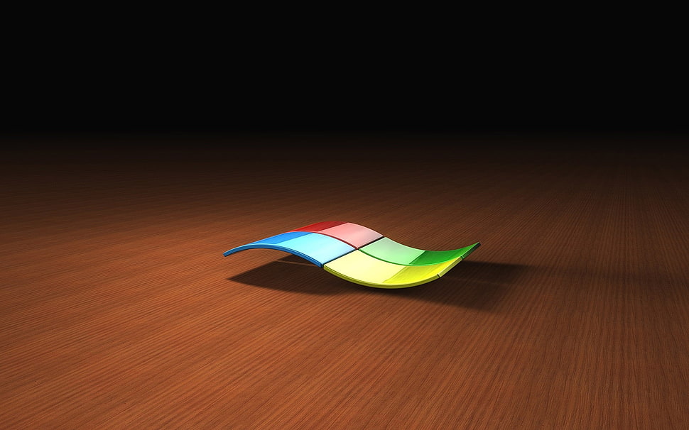 Microsoft logo illustration on brown surface HD wallpaper
